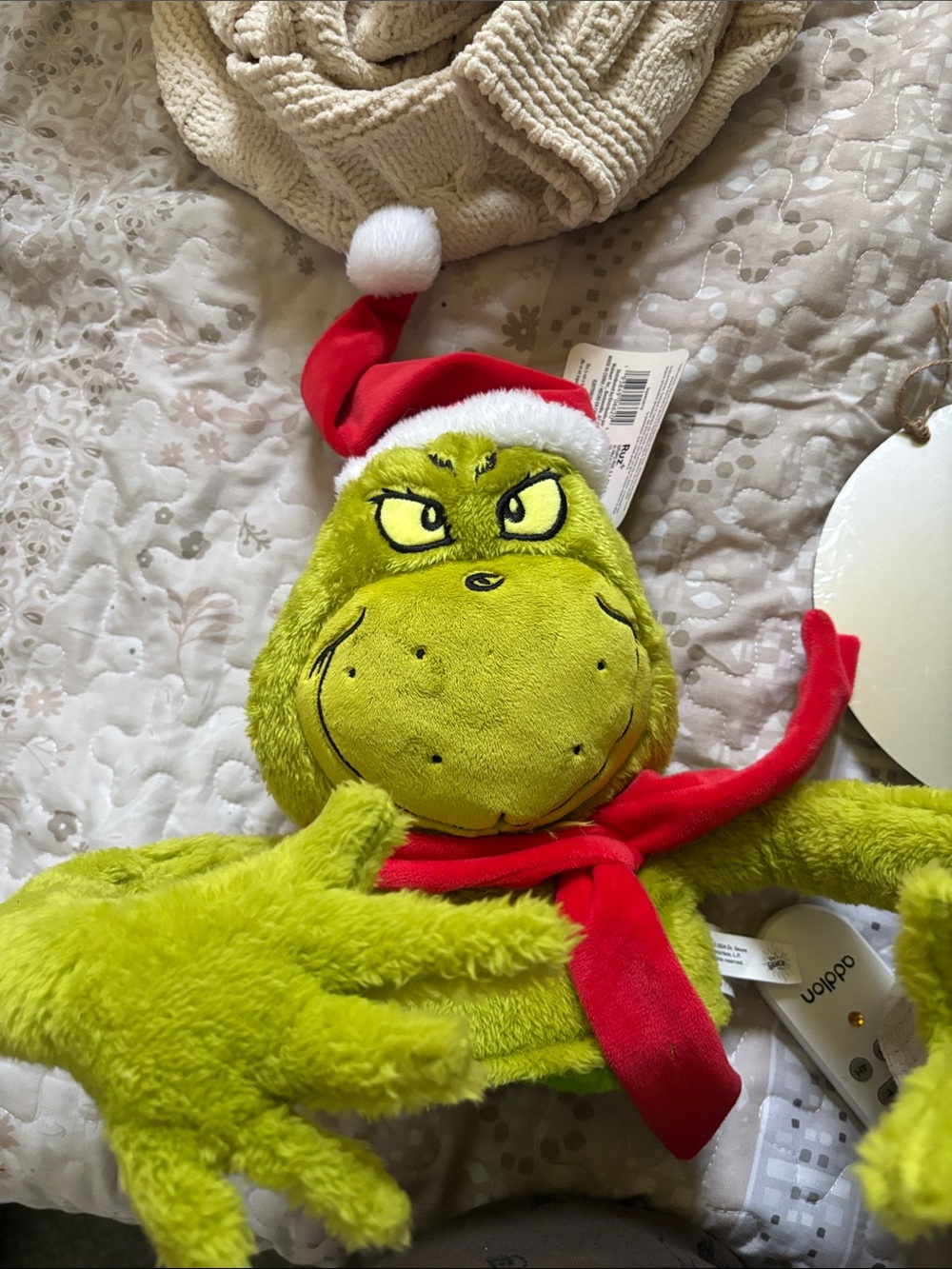Festive Grinch Plush Holiday tree topper in Bright Green with Red Hat